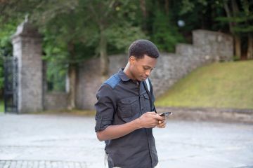 BME sutdent on mobile phone