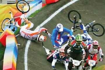 Group of BMX riders fall during race Group of BMX riders fall during race