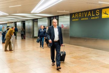 Brussels, Belgium, May 2019 Brussels airport, people waiting and going to meet their friends and families, arrivals hall