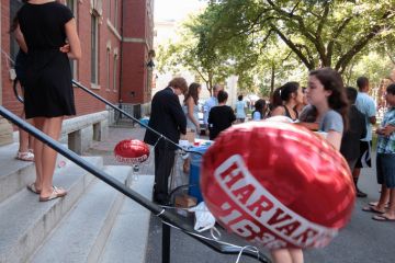 Cambridge, USA - August 27, 2012 Harvard University students welcoming freshmen in Cambridge, Massachusetts, USA on August 27, 2012
