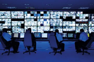 Control room with CCTV camera footage on screens