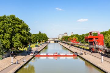 canal de l'Ourcq splitting the parc de la Villette in Paris, France