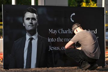 Arizonans mourn Turning Point USA Founder Charlie Kirk outside of the Turning Point USA headquarters on September 10, 2025 in Phoenix, Arizona