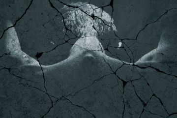 Cracked photograph of man's back during torture/interrogation Cracked photograph of man's back during torture/interrogation