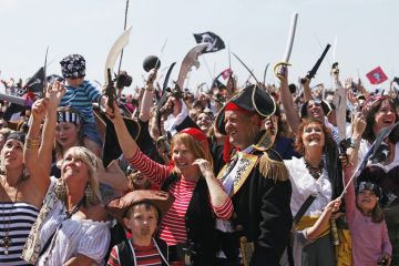 Crowd of people dressed as pirates Crowd of people dressed as pirates