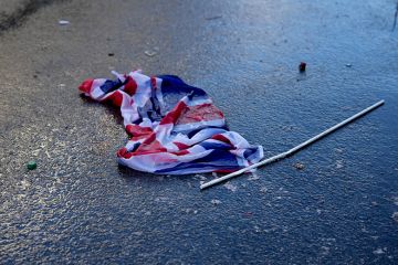 A Union Jack flag is seen discarded on the ground, to illustrate Whitehall cuts ‘undermining’ international education expansion. A Union Jack flag is seen discarded on the ground, to illustrate Whitehall cuts ‘undermining’ international education expansion.