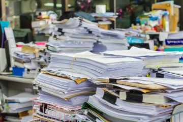Documents stacked high