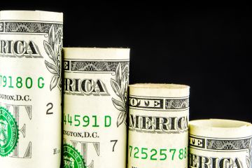 A bar chart of dollars, stepping down, illustrating declining funding for universities