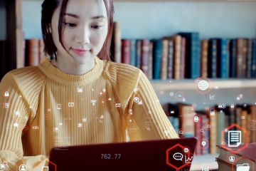 A student with a computer, illustrating edtech