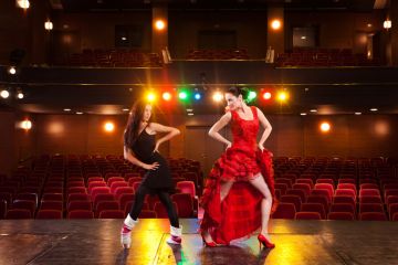 Dancers perform in an empty theatre, illustrating vacuous university strategy