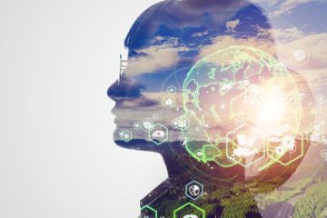 A head silhouette with the Earth superimposed on it