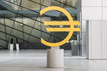 Euro sign at the entrance to the new european central Bank building in Frankfurt, Germany
