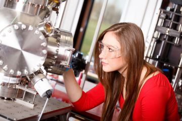 Female student working in a laboratory Female student working in a laboratory