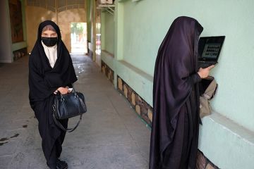 Two female university students who have been notified that their course has been terminated by the Taliban seen on 15 September, 2021 in Afghanistan. The recent internet blackout deepens the crisis for Afghan universities.