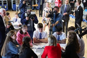 Jenny Gilruth Cabinet Secretary for Education and Skills meets pupils receiving exam results at Kings Park Secondary School 