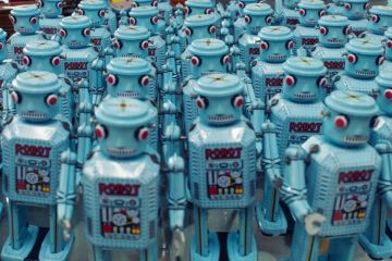 Group of blue robots facing camera Group of blue robots facing camera