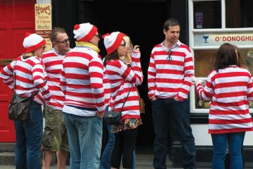 Group of identically-dressed tourists sightseeing in Dublin Group of identically-dressed tourists sightseeing in Dublin
