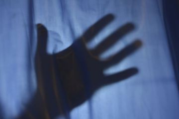 Hand behind sheet Hand behind sheet