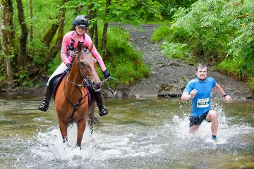 Runners & horses compete in the Man V Horse marathon, Wales. To illustrate differences in resources available to staff to demonstrate impact in the REF have raised concerns over an “unlevel playing field” that may disadvantage smaller universities