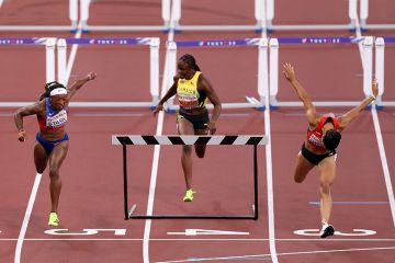 Runners at the finish line for the Women's 100 Metres Hurdles, with an added hurdle for the runner coming in 3rd. To illustrate that the revamped TEF could punish providers with lower ratings by limiting the number of additional students they can recruit.