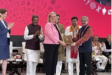 Professor Evelyn Welch, Vice-Chancellor and President of the University of Bristol, shakes hands with Shri Dharmendra Pradhan, India's Minister of Education