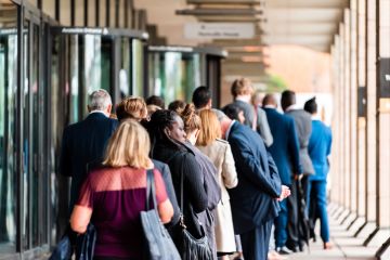 People many crowd crowded standing in line queue to Westminster station People many crowd crowded standing in line queue to Westminster station