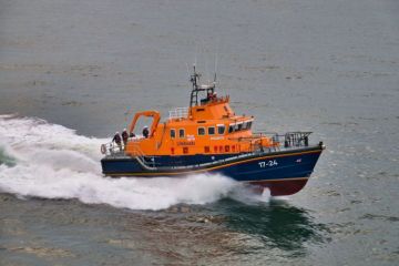 RNLI Lifeboat at sea, travelling at speed