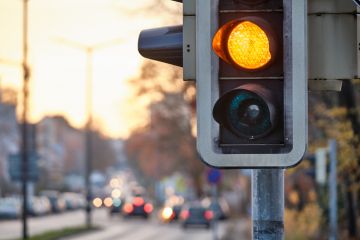 Closeup of traffic lights showing orange color