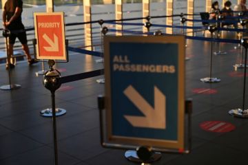 Priority lane and information sign in departures