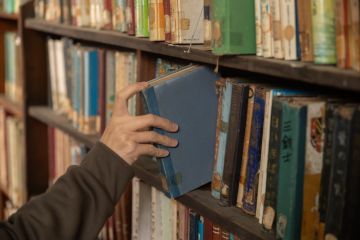Take the book stock photo Take the book stock photo