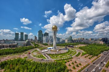 The central part of the capital of Kazakhstan - the city of Astana on a cloudy summer day.