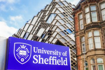 Close up of a sign for the University of Sheffield, with The Diamond building, Close up of a sign for the University of Sheffield, with The Diamond building,