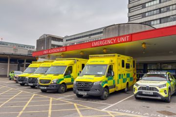 Ambulances waiting outside the accident and emergency department of The Heath Hospital near Cardiff city centre.