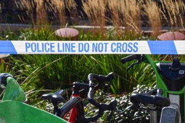 detail of police 'Do Not Cross' tape at a scene of an accident. detail of police 'Do Not Cross' tape at a scene of an accident.