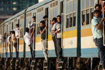 People Traveling on a train in Sri Lanka People Traveling on a train in Sri Lanka