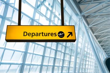 Departures sign at airport