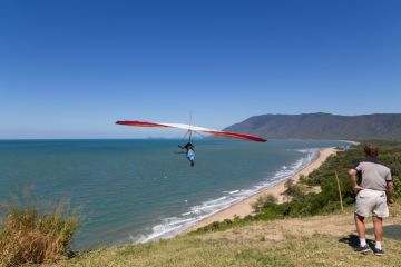 Hang glider starting from from Trinity Bay lookout. Hang glider starting from from Trinity Bay lookout.