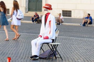 Street performer in 'invisible man' act