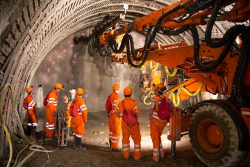 Engineers and workers examinating the construction of piperoof grouting for tunnel construction