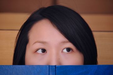 Female Chinese student with book Female Chinese student with book