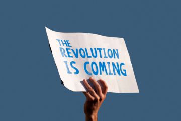 Sign saying "The revolution is coming" 