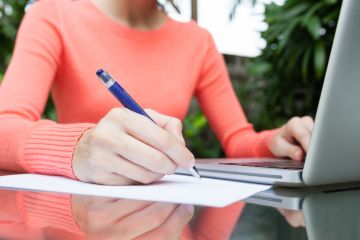 Woman taking notes