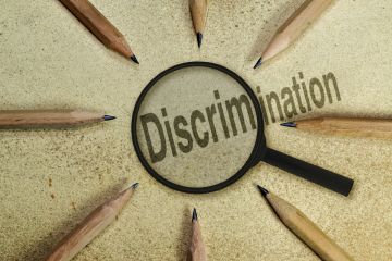 Word discrimination surrounded by pencils Word discrimination surrounded by pencils