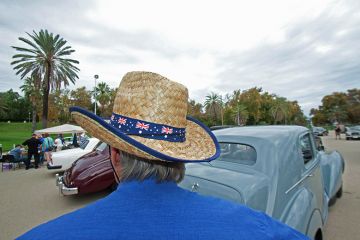 Man viewing cars at a rally of the Rolls Royce owners club of Australia in Adelaide. To illustrate that million-dollar-plus pay is ‘now the norm’ for Australian v-cs.