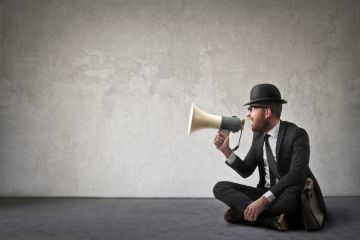 Man shouting into megaphone