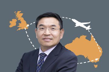 Max Lu with map showing route from Australia to the UK and back again. Max Lu with map showing route from Australia to the UK and back again.