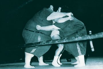 McGuire brothers squashing smaller wrestler McGuire brothers squashing smaller wrestler
