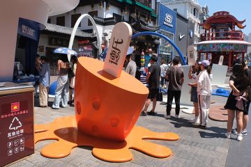 A melting ice cream installation is seen at Shenyang Zhongjie pedestrian street in the summertime on 22 July 2025 in Shenyang, Liaoning Province of China. As an illustration of whether universities can unfreeze China’s graduate job market.