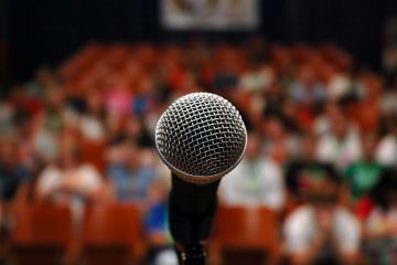 Microphone on stage ahead of speech Microphone on stage ahead of speech