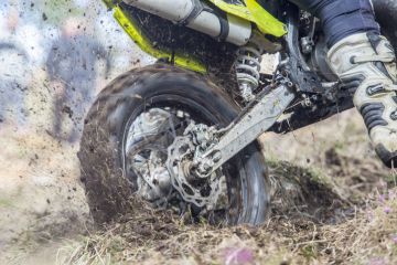 A motorbike stuck in the mud